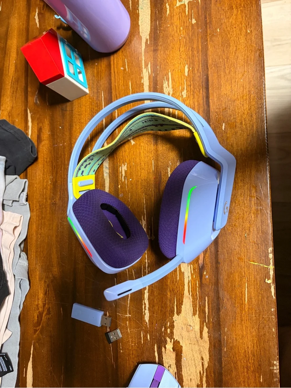 Logitech Purple & Light Blue Gaming Headset with Yellow/Green Headband Accent